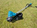 Battery powered electric grass trimmer