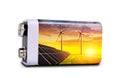 Battery with solar panels and wind turbines isolated on a white background. Royalty Free Stock Photo