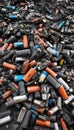 Battery waste danger: pile of old, used EV car batteries hazardous waste Royalty Free Stock Photo