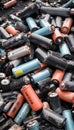 Battery waste danger: pile of old, used EV car batteries hazardous waste Royalty Free Stock Photo