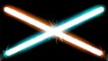 Battle on laser swords with sparks on a black background. Royalty Free Stock Photo