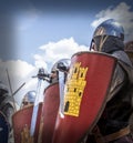 Medieval soldiers hit their shields before the battle Royalty Free Stock Photo