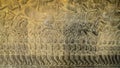 Battle scene bas relief in the temple complex of Angkor Wat in C Royalty Free Stock Photo