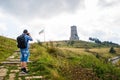 Shipka memorial with a bulgarian flag and a photographer, tourist Royalty Free Stock Photo