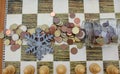 the battle for taking your savings is on the chessboard Royalty Free Stock Photo