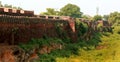 The battlement with dried trench of the ancient Brihadisvara Temple in Thanjavur, india.