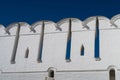 Battlements and narrow loopholes of the white-stone defensive wall of the Novodevichy Convent, Moscow 2021