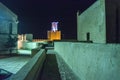 Battlements, pathways and towers of Badajoz muslim wall at night