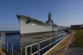 Battleship parked in pier near New Orleans