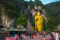 Batu Caves, gold statue Lord Murugan. Kuala Lumpur, Malaysia. Royalty Free Stock Photo