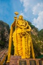 Batu Caves, gold statue Lord Murugan. Kuala Lumpur, Malaysia. Royalty Free Stock Photo