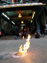 Fire lit as an offering in a temple of the Batu Caves. Malaysia Royalty Free Stock Photo