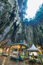 Batu Caves Kuala Lumpur Malaysia, scenic interior limestone cavern decorated with temples and Hindu shrines, travel destination in