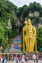 Batu Caves is a limestone hill that has a huge statue of The Lord Murugan Giant located at the entrance of Batu Caves. Royalty Free Stock Photo