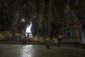 Tourists seen exploring and praying in the Hindu Temple, Batu Caves, Malaysia. Royalty Free Stock Photo