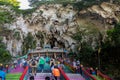 Batu Caves, Malaysia - 22 February 2023: Batu caves. Famous and iconic limestones with rainbow painting at Batu Cave. Batu cave