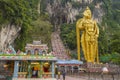 Batu caves, Malaysia - 2014: people visiting sacred hindu shrine Batu caves on outskirts of Kuala Lumpur, Malaysia Royalty Free Stock Photo