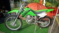 Batu City, Indonesia - November 20, 2022 : Kawasaki trail adventure motorbike on display at the Motocross Event exhibition booth