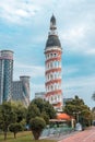 Batumi, Adjara, Georgia - 16.06.2018: Old Tower And Modern Skyscraper Residential House In Batumi