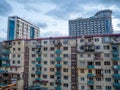 Batumi architecture concept. old house against the backdrop of a new high-rise building. Contrast in architecture. Housing for Royalty Free Stock Photo