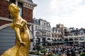 Golden stutue of woman on the Piazza square in Batumi