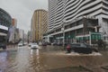 27.11.2023, Batumi, Georgia: a car drives along a flooded street after a strong storm