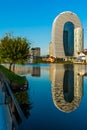 BATUMI, GEORGIA: Department of Justice, Courtyard Marriott Batumi Hotel and skyscrapers are reflected in Lake Ardagani.