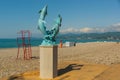 BATUMI, GEORGIA: Dolphin sculpture on the beach in Batumi.