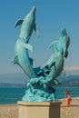 BATUMI, GEORGIA: Dolphin sculpture on the beach in Batumi.