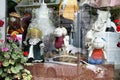 BATUMI, GEORGIA - JUNE 28, 2023: Cute and funny fabric toy dolls displayed for sale in the showcase of one of the stores in Batumi