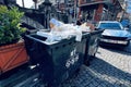 BATUMI, GEORGIA - JUNE 27, 2023: Large plastic garbage bins standing on the street in the center of Batumi