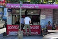 BATUMI, GEORGIA - JUNE 29, 2023: Unknown people buying shawarma at a small local shop in Batumi