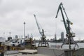 Batumi, Georgia - June 26, 2021: View of the seaport of Batumi. Port cranes. Cargo terminal. Ships and berths. Royalty Free Stock Photo