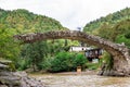 Batumi, Georgia Ã¢â¬â September, 2021: Arched bridge of Queen Tamar, erected across the Adjaristtskhali river, ancient about 900