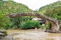 Batumi, Georgia Ã¢â¬â September, 2021: Arched bridge of Queen Tamar, erected across the Adjaristtskhali river, ancient about 900