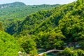 BATUMI, GEORGIA: Stone arch bridge of Queen Tamara near the Adjaristskali River on a sunny summer day. Royalty Free Stock Photo