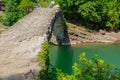 BATUMI, GEORGIA: Stone arch bridge of Queen Tamara near the Adjaristskali River on a sunny summer day Royalty Free Stock Photo