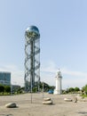 Batumi Lighthouse and Alphabet Tower with the Georgian alphabet are stand are on the embankment of Batumi city - the capital of