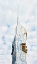 Batumi Tower and carousel against a cloudy sky