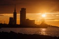 Batumi urban skyline at sunset. Shilouette of modern buildings on sunset background