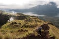 Batur volcano and Agung mountain panoramic view at sunrise from Kintamani Royalty Free Stock Photo