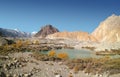 Batura glacial lake among Karakoram mountain range. Passu, Pakistan. Royalty Free Stock Photo