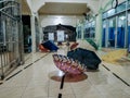 Baturaja, Indonesia - May 2021. some worshipers waiting for the rain to stop in the month of Ramadan.