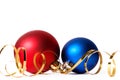 Two Christmas baubles with gold ribbon spirals Royalty Free Stock Photo