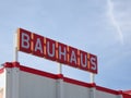 Bauhaus store logo against blue sky