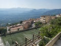 Baunei, Sardinia, Italy, September 19, 2020: View of soccer field at terrace of old romantic village Baunei with view of