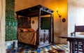 Interior of Bauska Castle - Duchess bedroom with wooden carved tester bed