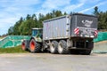 Fendt tractor with a loader wagon, working on a biogas plant