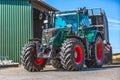 Fendt tractor with a loader wagon, working on a biogas plant