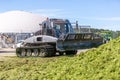 Prinoth Leitwolf snowcat prepares the silage for the biogas plant